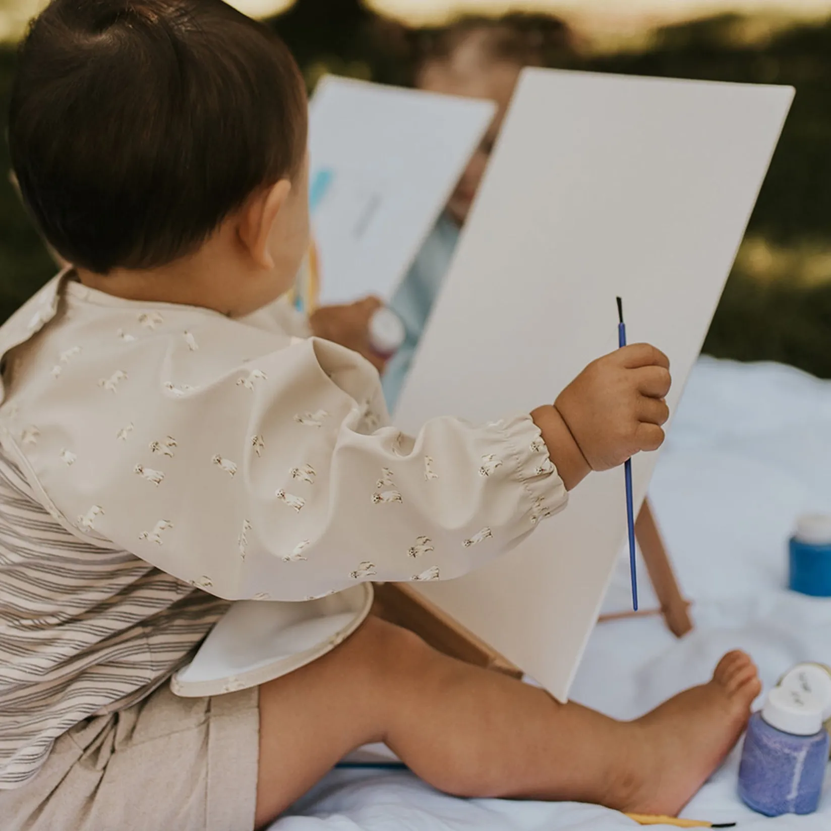 Breastfeeding|Bibs>Micasso Long-sleeved Bib with integrated pocket 6-24m -Dogs